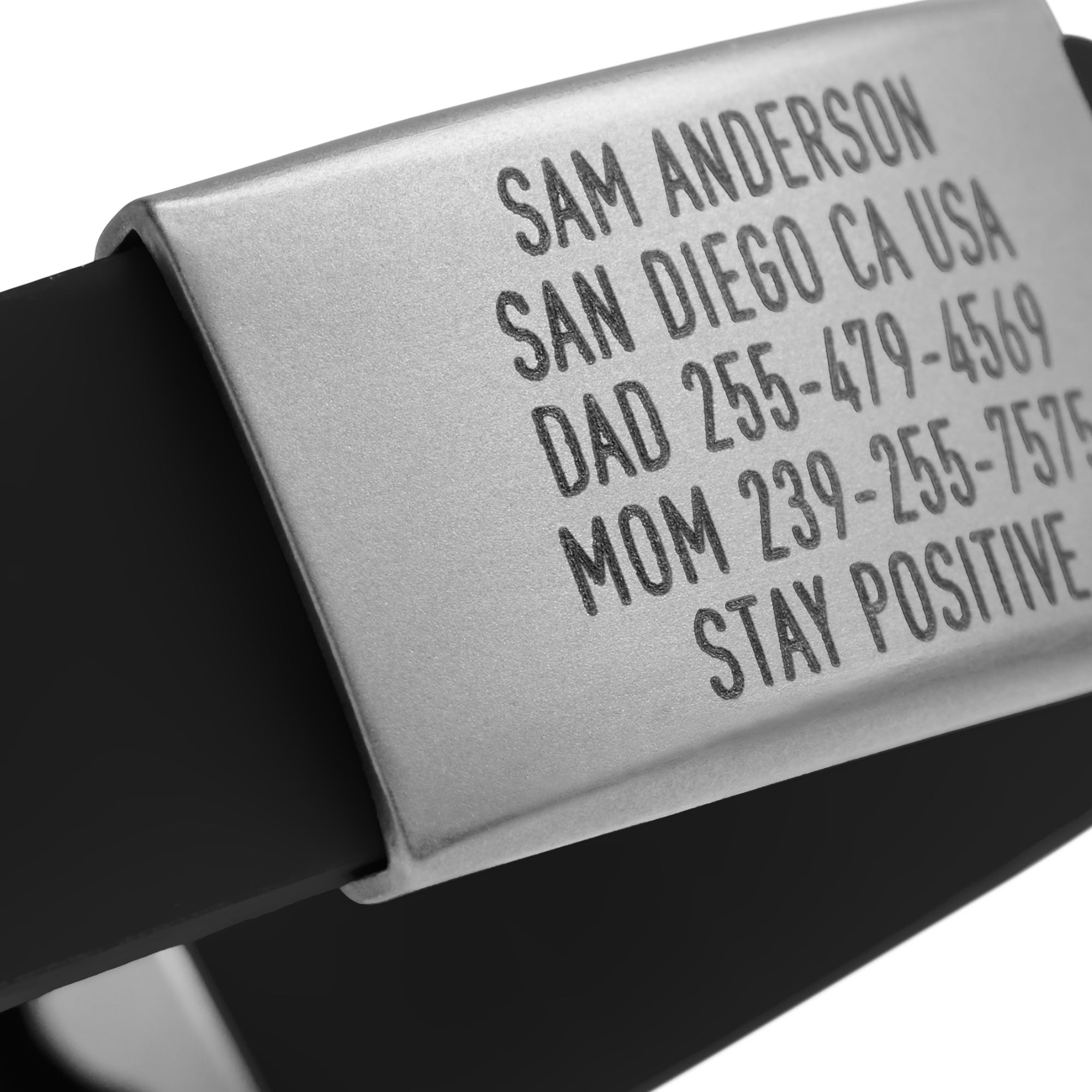 Close-up of a Black silicone with silver ID tag and silver matching double locking clasp wristband Pro Thin