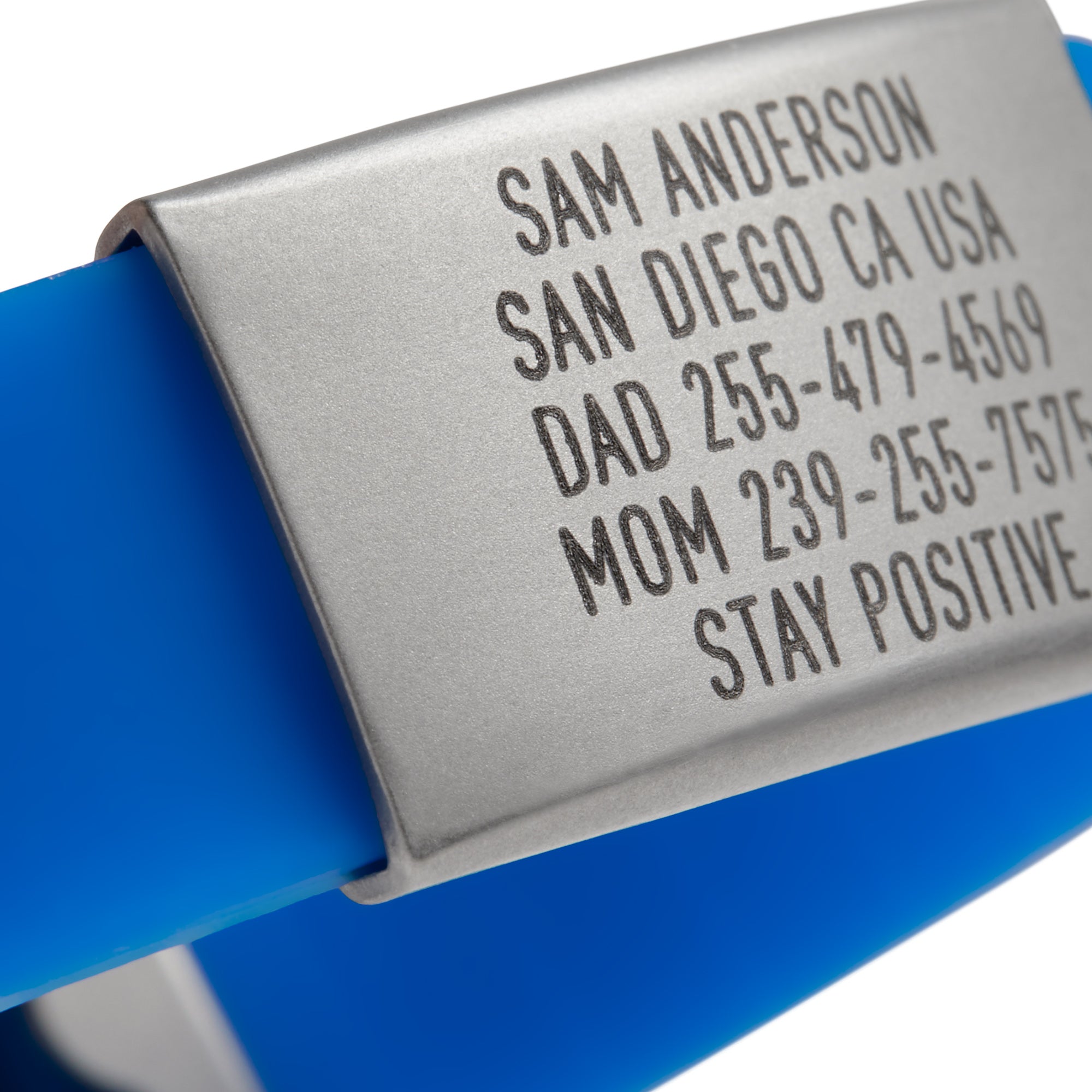 Close-up of a Blue silicone with silver ID tag and silver matching double locking clasp wristband Pro Thin