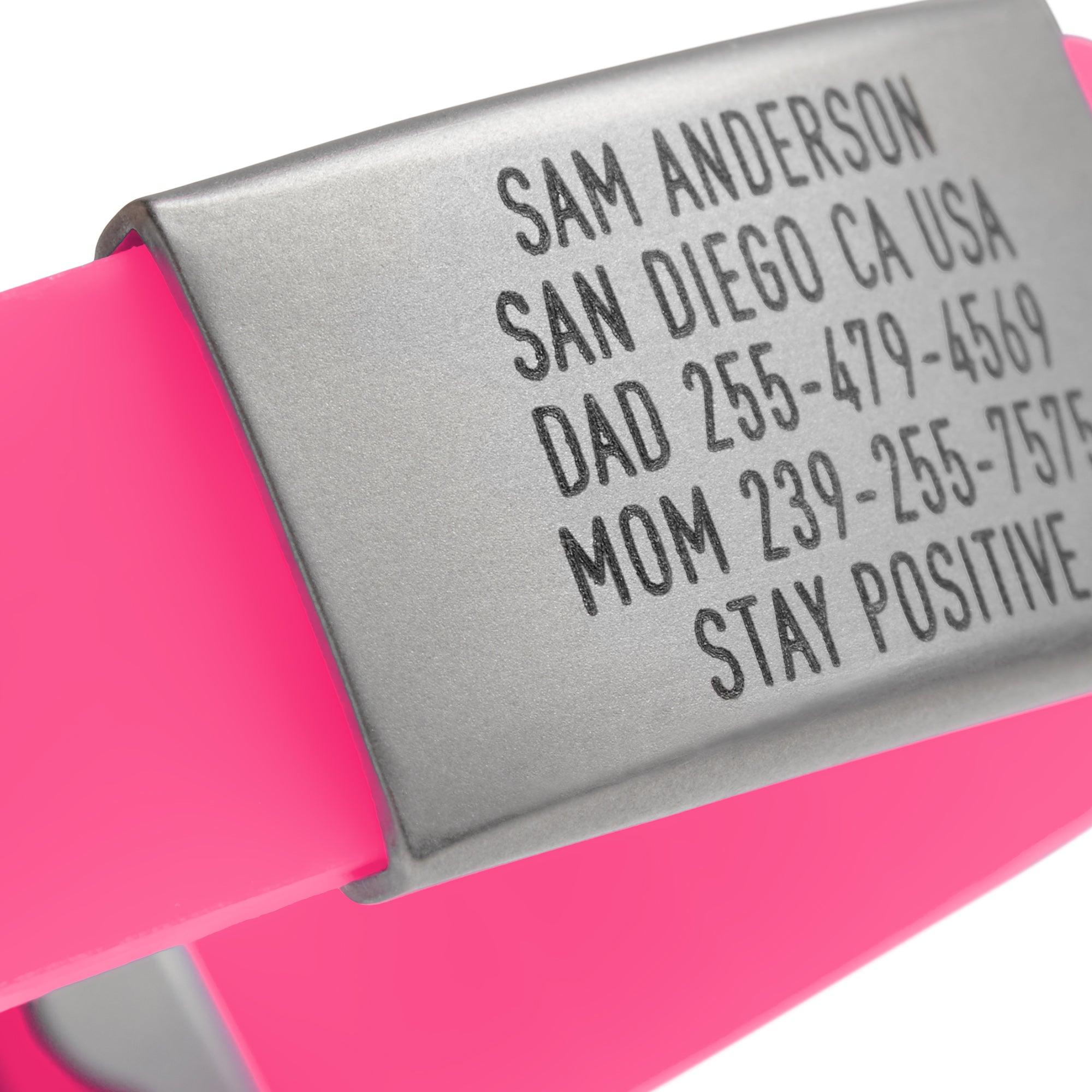 Close-up of a Pink silicone with silver ID tag and silver matching double locking clasp wristband Pro Thin