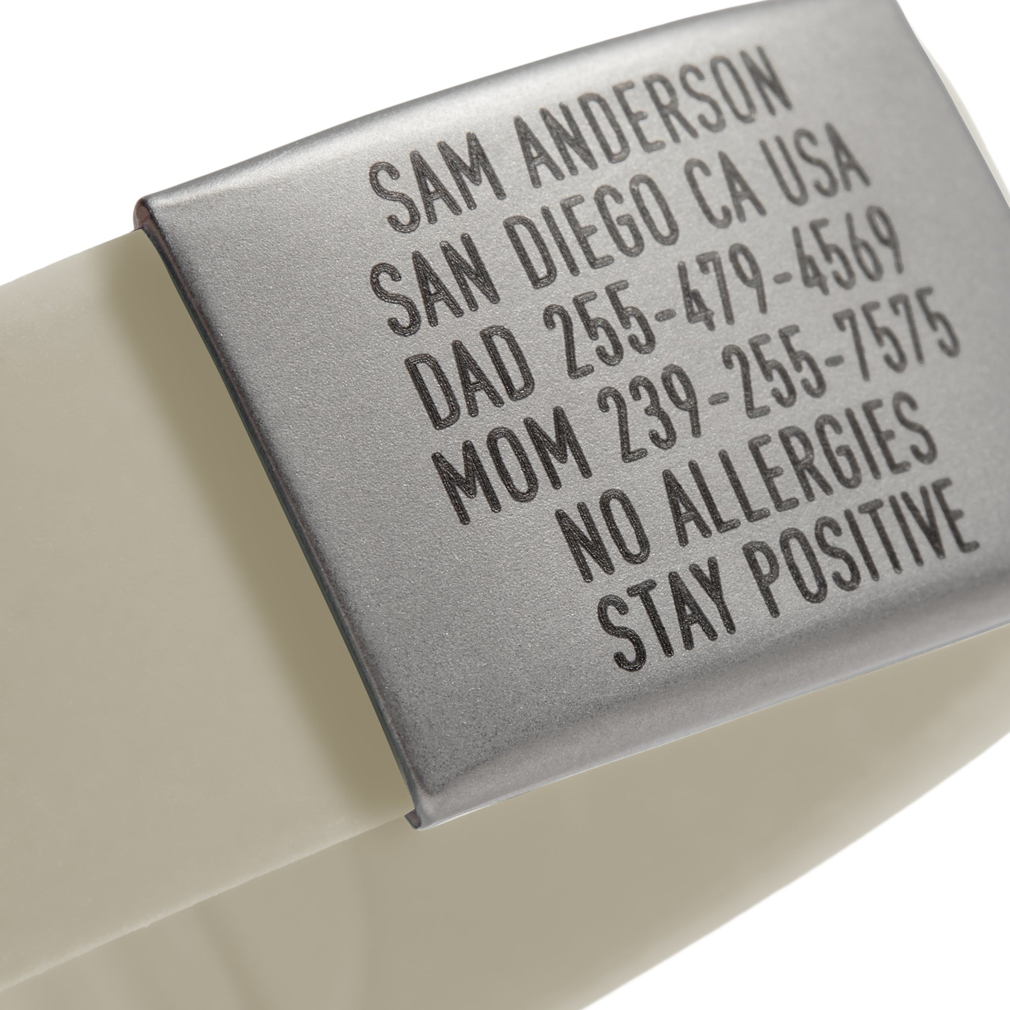 Close-up of Vanilla White Emergency ID wristband Sleek by BRECK iD