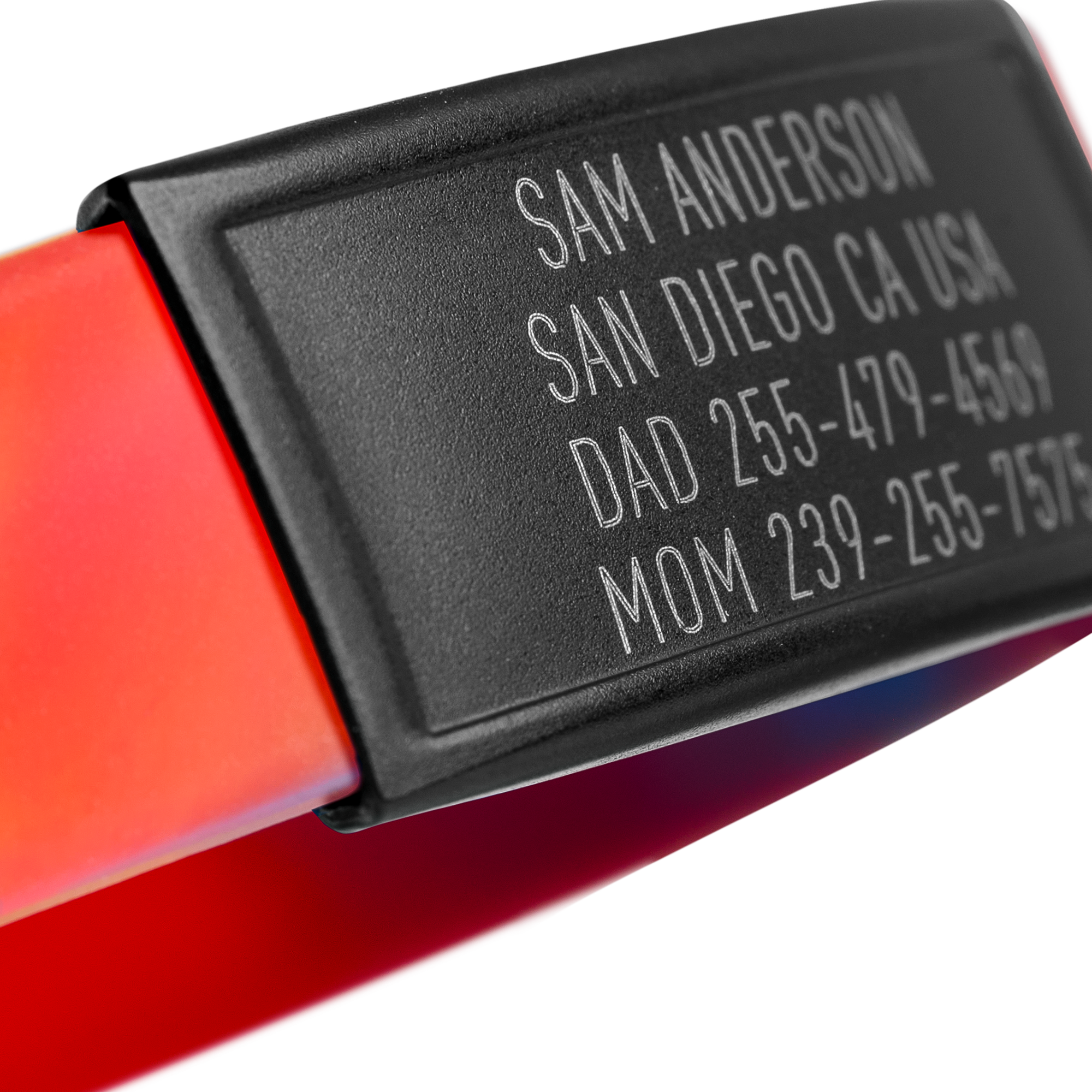 Close-up of Red, Yellow and Blue silicone with Black ID tag Sprint wristband by BRECK iD