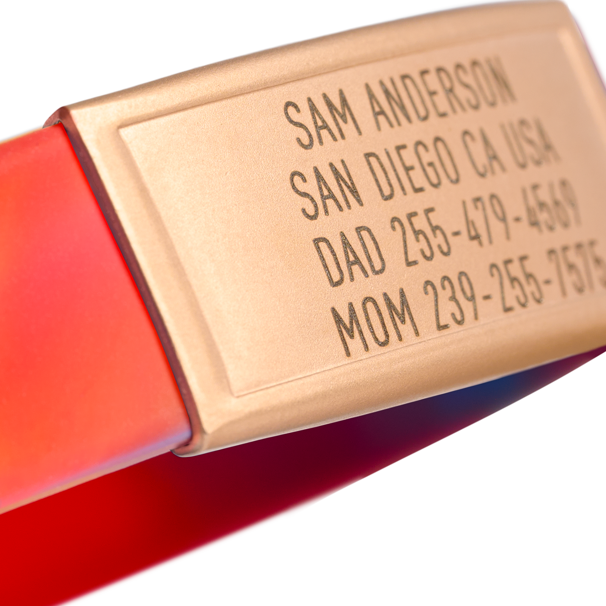 Close-up of Red, Yellow and Blue silicone with Gold ID tag Sprint wristband by BRECK iD