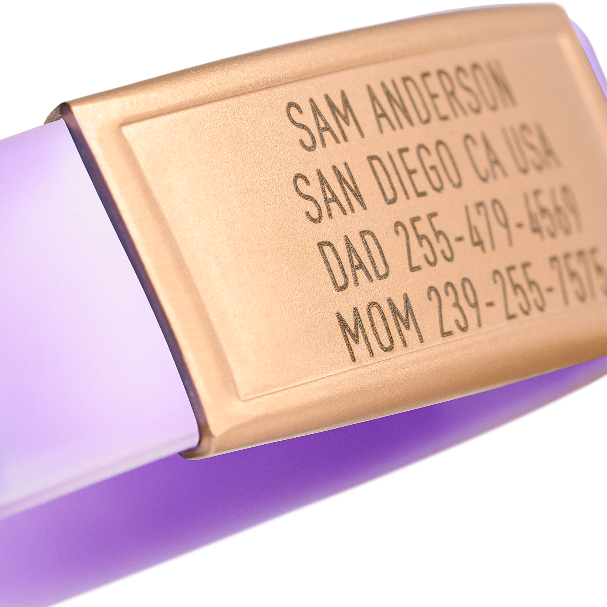 Close-up of Purple and White silicone with Gold ID tag Sprint wristband by BRECK iD