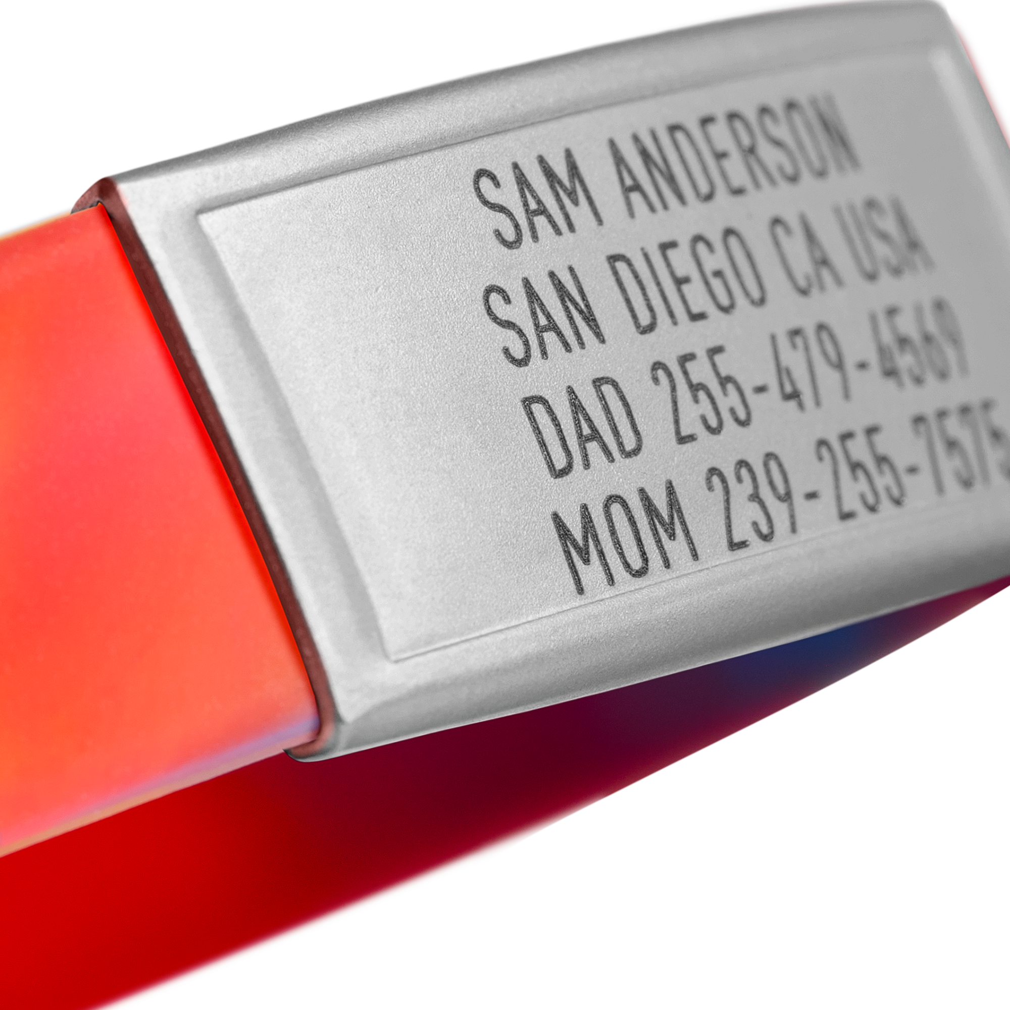 Close-up of a Red, Blue and Yellow silicone with Silver ID tag Sprint wristband by BRECK iD