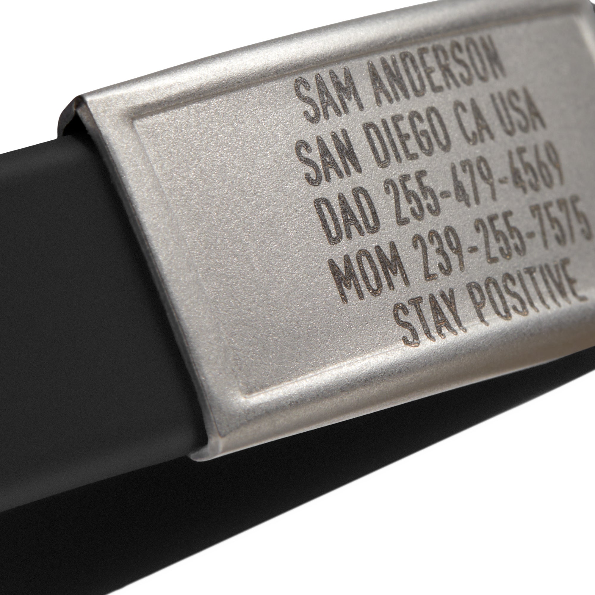 Close-up of a Black silicone with Silver ID tag Sprint wristband by BRECK iD