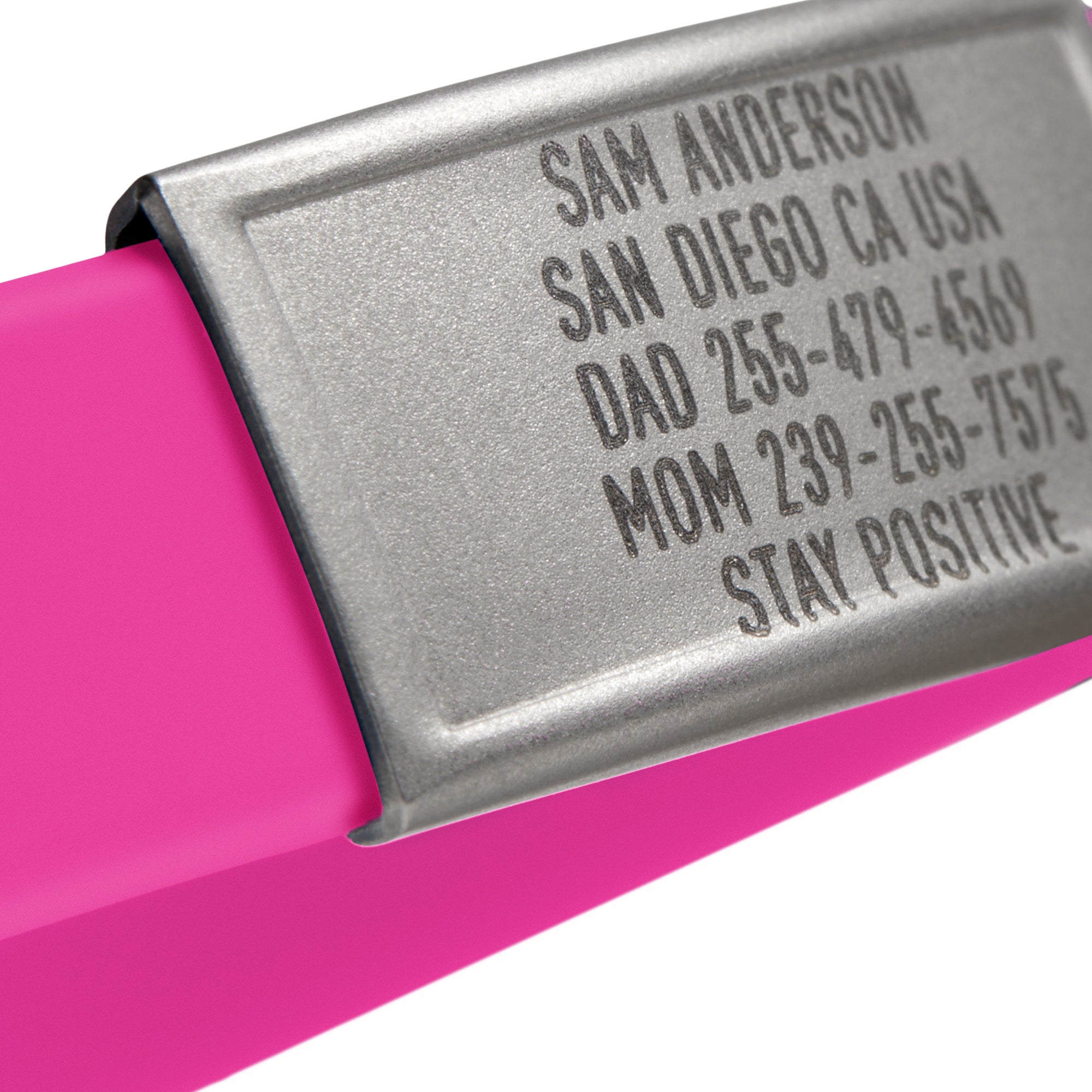 Close-up of a Pink silicone with Silver ID tag Sprint wristband by BRECK iD